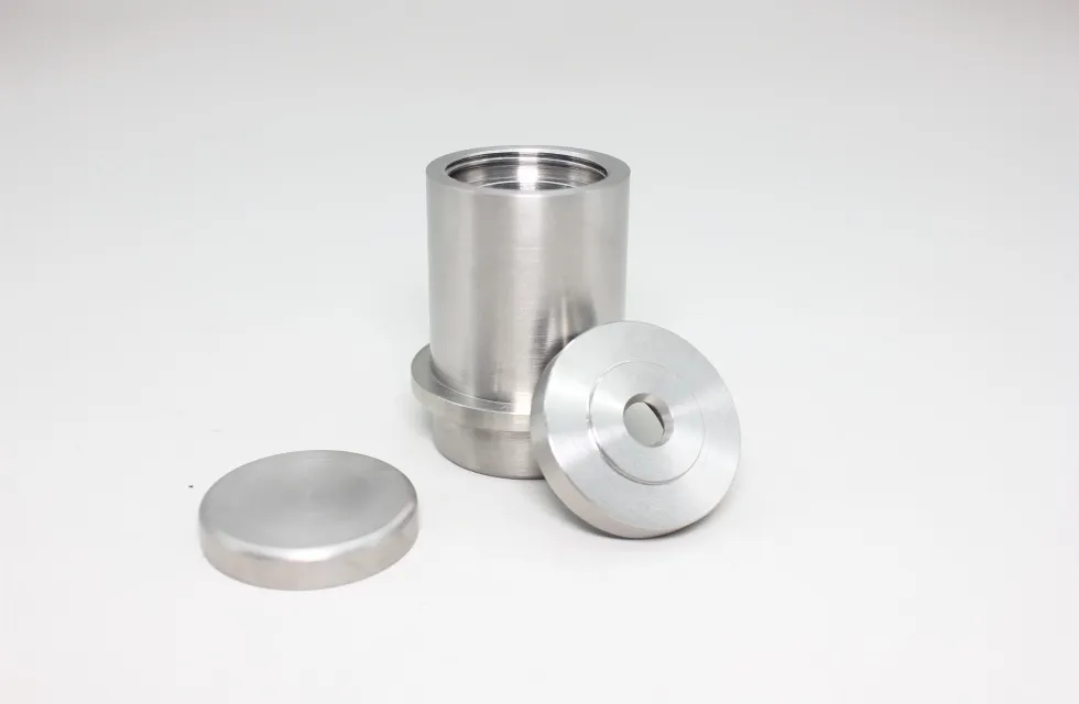 cad é an prionsabal oibre a bhaineann le sciath an chóimhiotail tungstan?